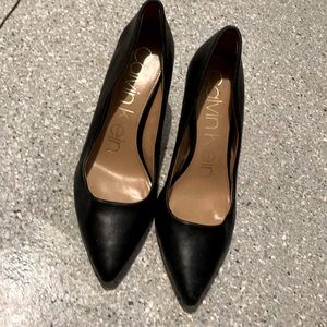 Black Calvin Klein pumps